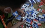 Tình trạng thuốc trị Covid-19 và kit xét nghiệm giả tại Việt Nam